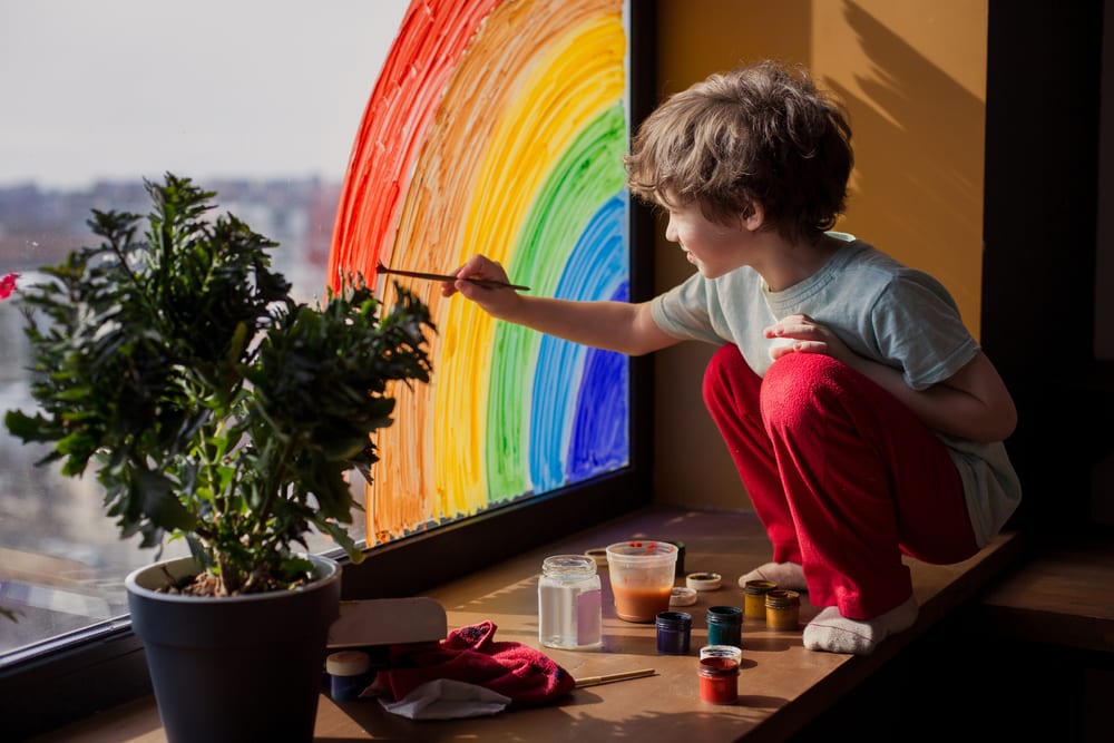 Child with Autism paints on screen