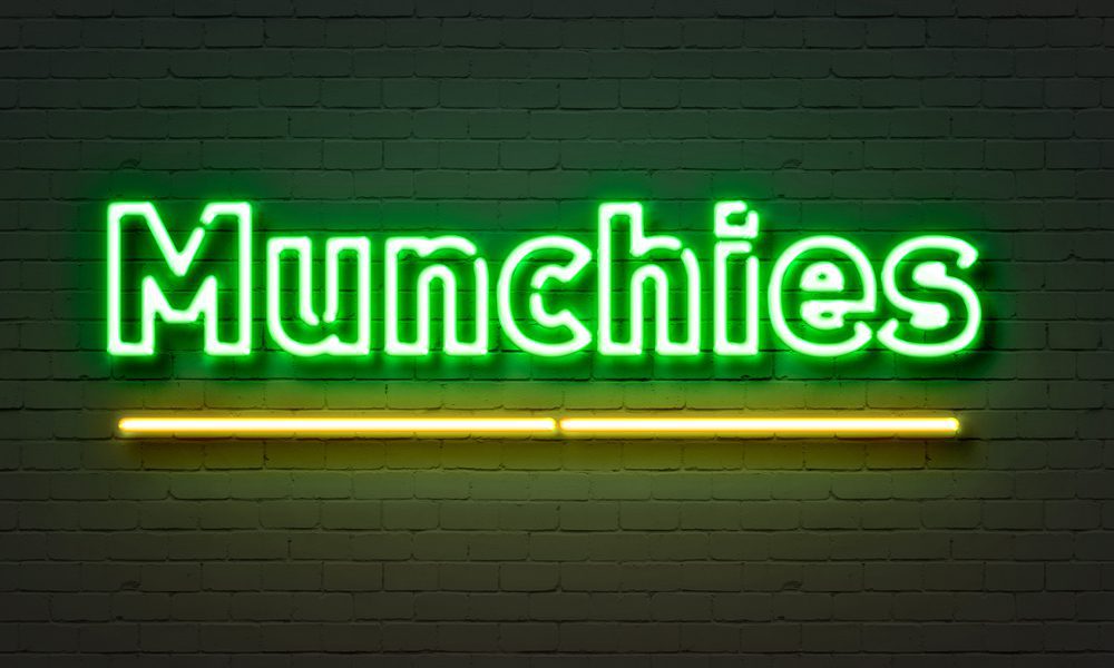 Munchies,Neon,Sign,On,Brick,Wall,Background